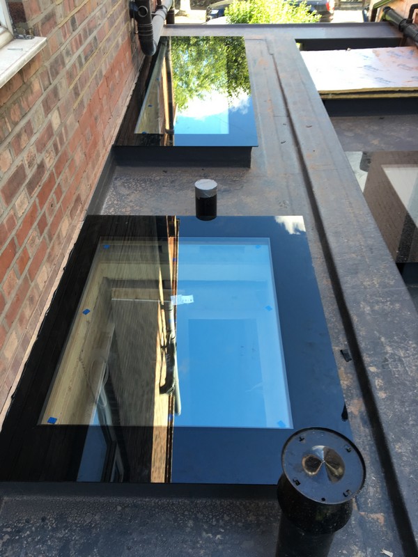 Multiple flat roof skylights on extension in Neasden